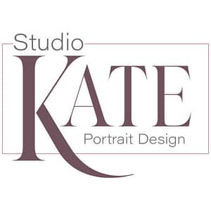 Logo for Studio Kate Portrait Design.  It is made of a thin lined rectangle which encases a large burgundy KATE in an elegant serif font as the tail of the K drops below the box and under the other words.  Studio rests above the K interrupting the top line of the rectangle, and Portrait Design fall under the ATE, both in a smaller thin luxuriously modern sans serif font.